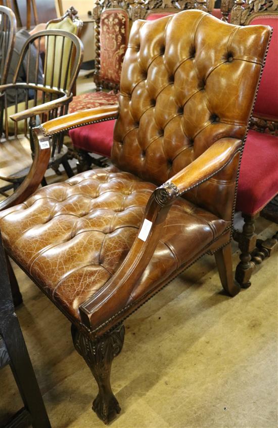 A George III style tan leather armchair